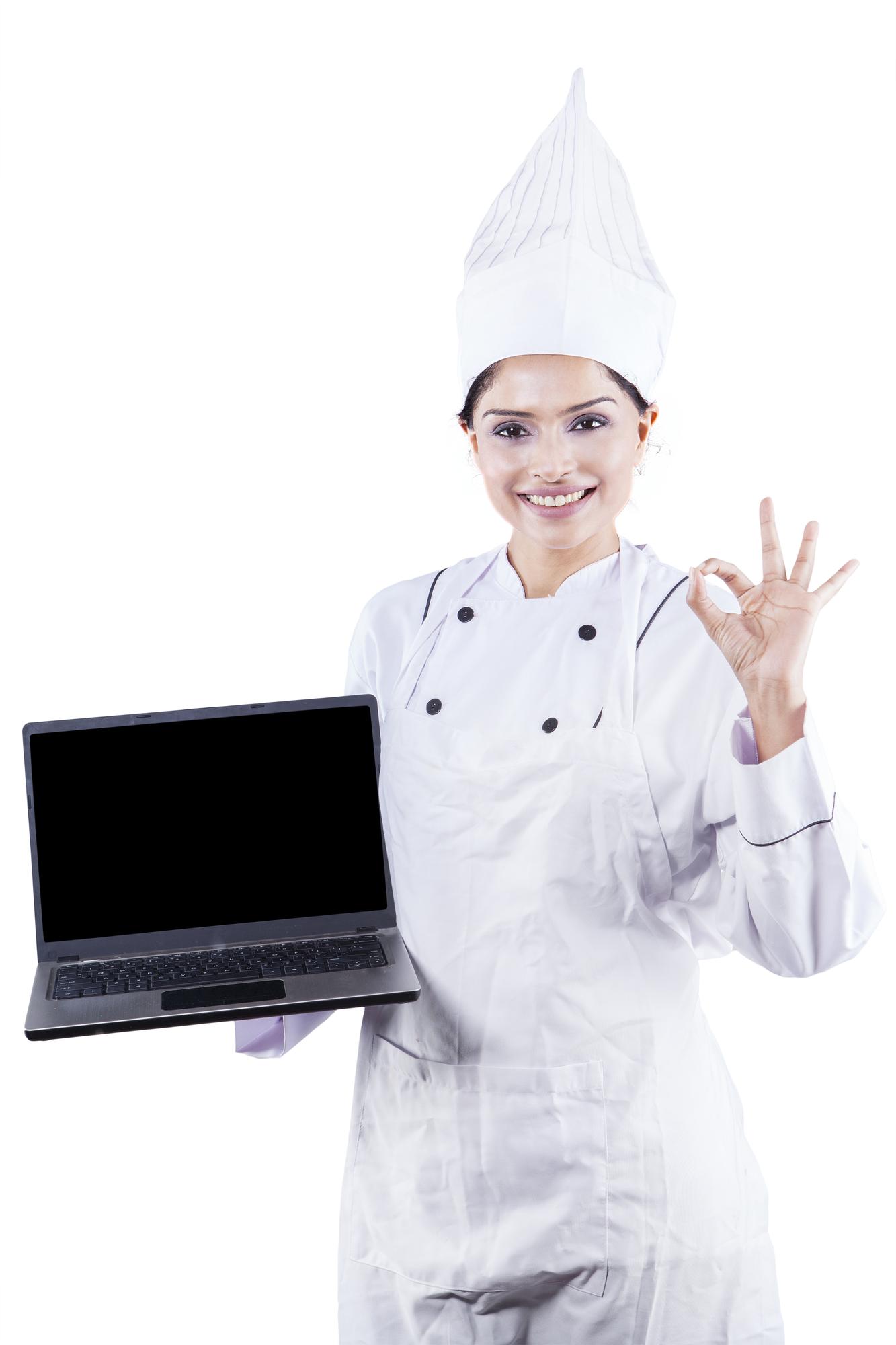 Chef teaching an online class in a modern kitchen